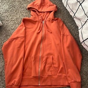 Hooded Long Sleeved Zip Up Hoodie